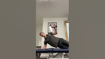 Half side plank dumbbell shoulder external rotation