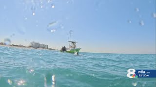 North Port scuba diver dragged by boat after flag-line caught in propellor