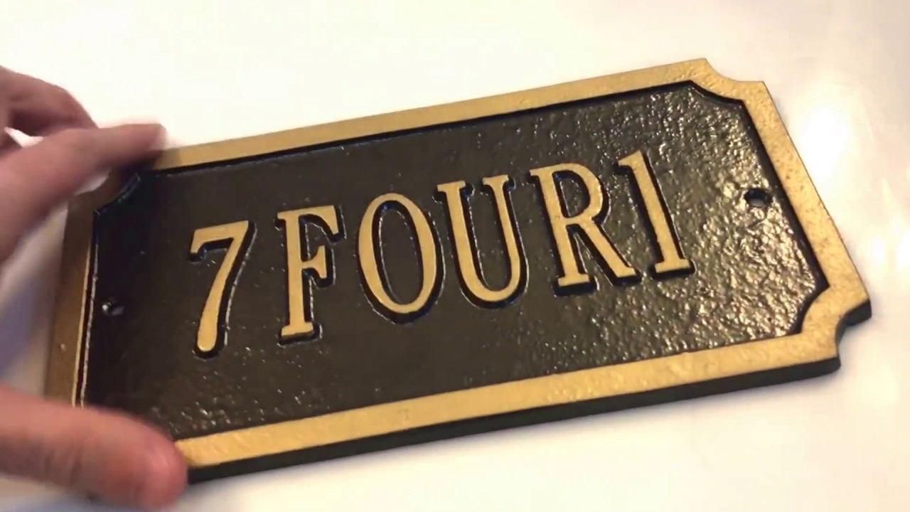review of a raised letter aluminum address casting with bronze raised letter