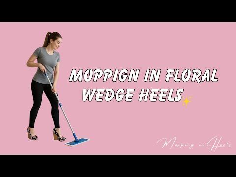 Moping in floral wedge heels