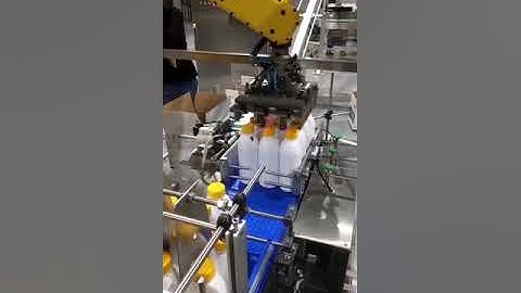 Milk bottle automatic sorting feeding robot hand cartoning machine encasing line testing video