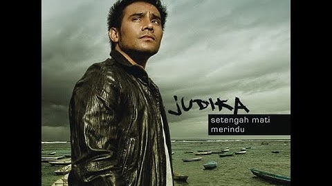 JUDIKA - SETENGAH MATI MERINDU (Video Lirik)
