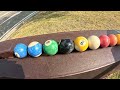Roll, colorful marbles! Who will win the marble race on the track?