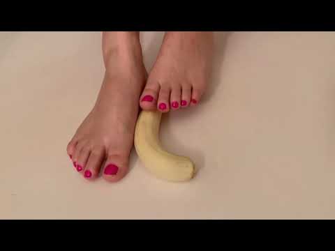 Sexy smashing banana with feet