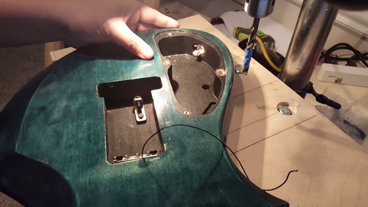 Brass inserts and machine screws replacing wood screws for your guitars