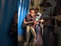 Ndooni Mweene Gitaa Zeze Playing Rythm Guitar