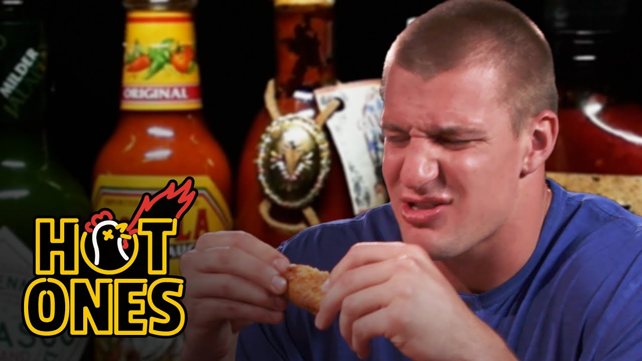 Rob Gronkowski Gets Blindsided by Spicy Wings | Hot Ones | First We Feast