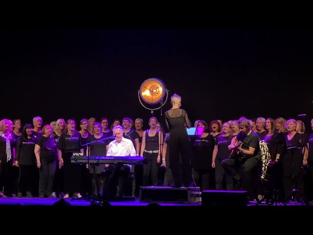 Howard Jones performs 'What is Love?' with the Funky Voices Choir in Colchester October 2022