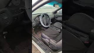 1999 White Nissan Maxima Hosted by Equipbid.com