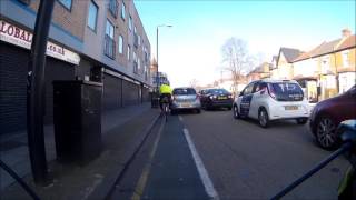 Cyclist doesn't seem very happy with that lane change