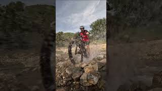 Nick Claire splashes through a stream on the Yamaha YDX Moro 07.