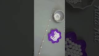 Bunga Cantik dari Gagang Sapu dan Mutiara