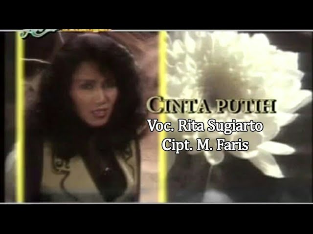 Rita Sugiarto - Cinta Putih (Official Lyric Video) class=