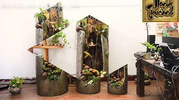 Hòn non bộ thác nước nhỏ trong cây cổ thụ