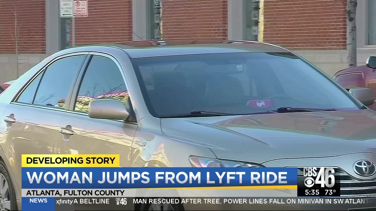 Woman jumps out of a moving Lyft car in fear of being attacked - YouTube