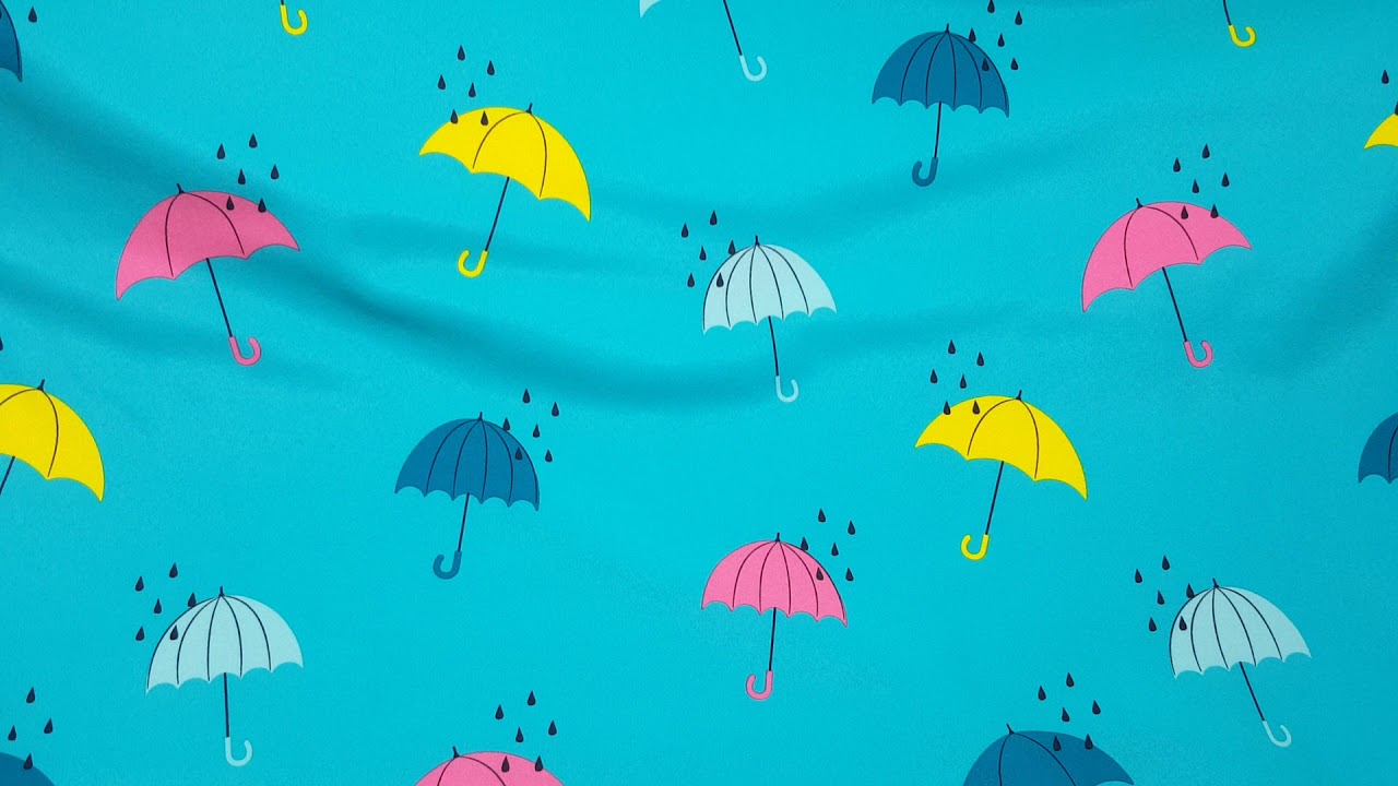 soft shell fabric in dark turquoise with colorful umbrellas