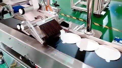 Automatic paper sheet paging flat surface labeling machine