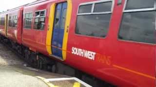 2 trains at Clapham Junction - 16th February 2013