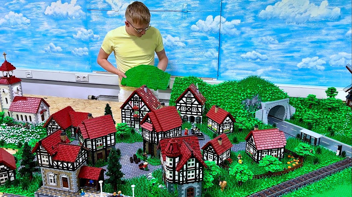 Riesen Baufortschritt: Hügellandschaft hinter dem Dorf... - Bau einer LEGO Stadt Teil 290.