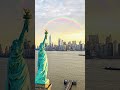 A magical rainbow arching over the New York City skyline!#StatueOfLiberty #NewYorkCity  #NYCSkyline