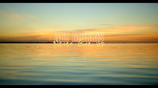 Art Morris - Never Give Up [Official Lyric Video] Resimi