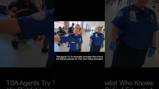 TSA agent try to intimidate journalists.