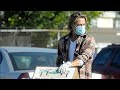 Brad Pitt giving food to LA Community