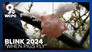 Artist makes pigs 'fly' through downtown Cincinnati with BLINK display