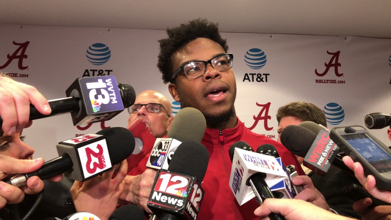 Damien Harris after Iron Bowl, reacts to falling camera man