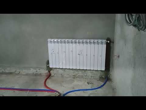 فيديو: مشعات التدفئة الكهربائية المثبتة على الحائط: الوصف