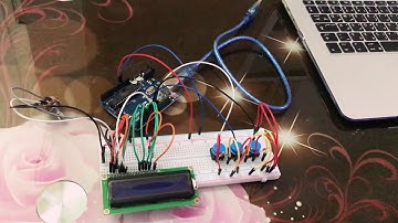 Create a smart traffic light system using LCD display. Embedded systems