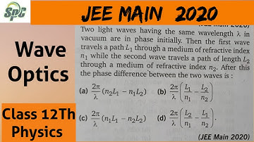 Two light waves having the same wavelength lemda in vacuum are in phase initially.  Then the first w