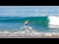 Perfect Point Break for Skimboarding. Professionals Run on to Surfing Wave