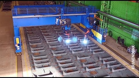 Panel Welding Gantry in operation - automated robot welding at shipyards