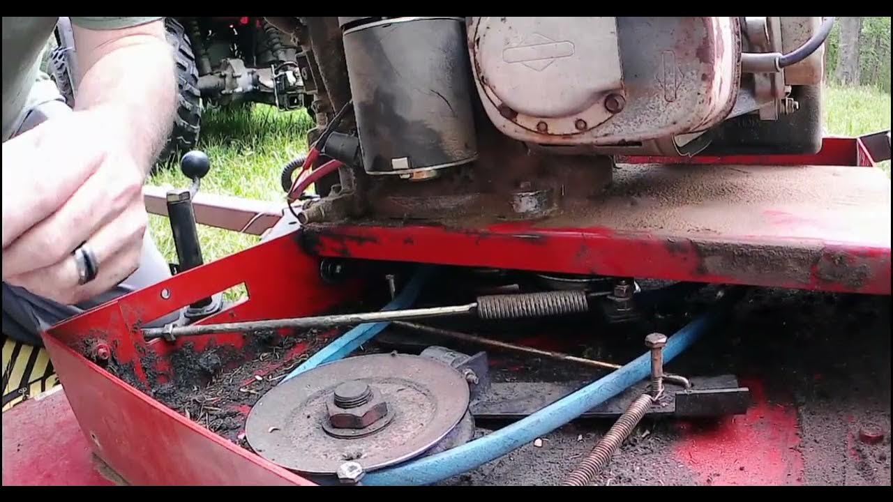 Changing and adjusting a belt on a Swisher 44-inch finish mower - YouTube