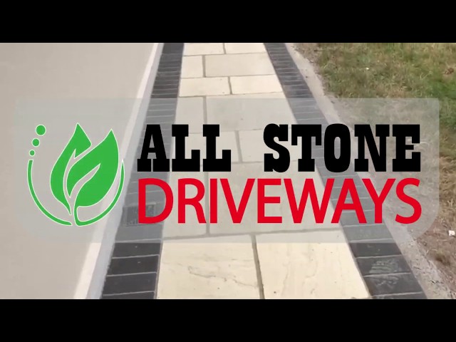 Asphalt Driveway With Pathways Running Around House - All Stone Driveways