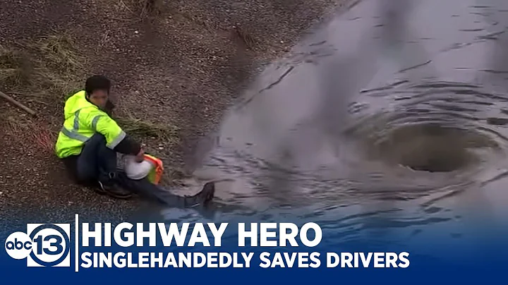 HIGHWAY HERO: Faced with flood, man single-handedl...