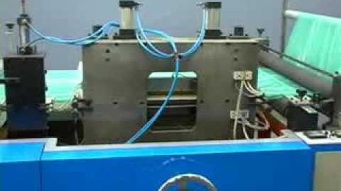 Automatic ribbon through roll garbage bag  making machine
