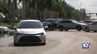 Stalled-out cars litter Dania Beach streets