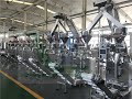 Vertical packing machine Volumetric snacks packaging machine nuts automatic packing machine system