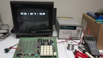 COSMAC Elf digital clock using PIXIE graphics