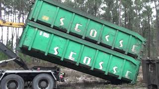 Dépose de 4 bennes vides sur un chantier