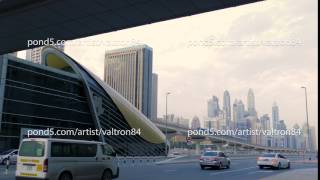 futuristic city landscape with roads, cars, trains, skyscrapers in Dubai, UAE