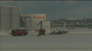 More than a dozen injured when Delta plane overturned while landing in Toronto