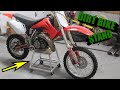 Welded aluminum dirt bike stand on wheels