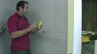 Install a grab bar with the Ghostud™ - the only wall anchor that acts like a stud!
