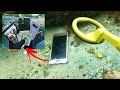 Achei Celulares Go Pro e Dinheiro mergulhando na praia (Detector de metais)