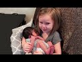 Priceless moments when toddler meets newborn