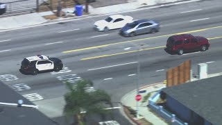 Police chase: LAPD in pursuit of armed carjacking suspect