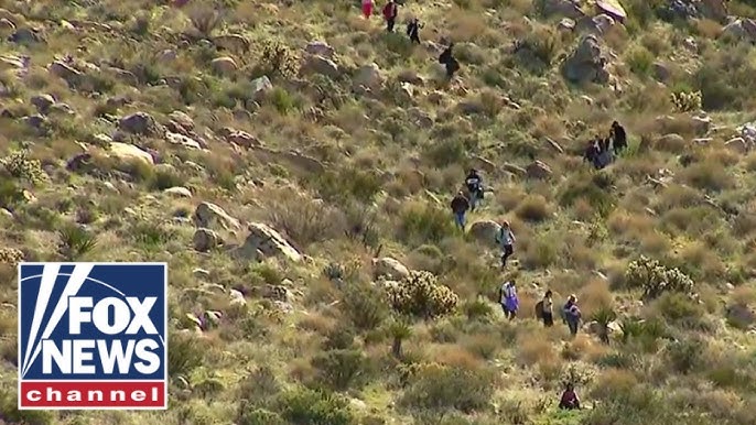 Migrants Scale Mountain Like Trail Of Ants To Get Into Us
